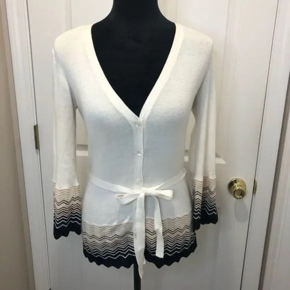 Trina Turk cream cardigan scalloped hem sweater.